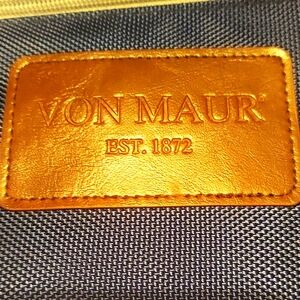 Leather adorned vintage von maur canvas lunch / cosmetic bag.